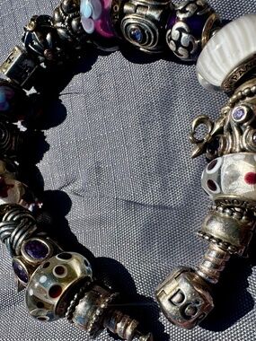 Beautiful Pandora bracelet with Charms, some Glass Charms